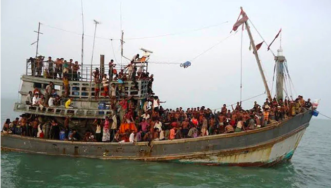 A boat carrying Rohingya Refugees, Image Source: Bangladesh Navy